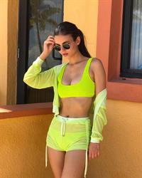 Victoria Justice in a sexy green bikini at the beach.












