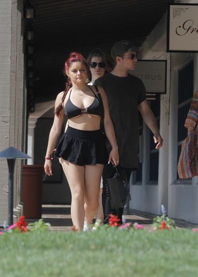 Ariel Winter paparazzi pictures in black bikini top and short skirt