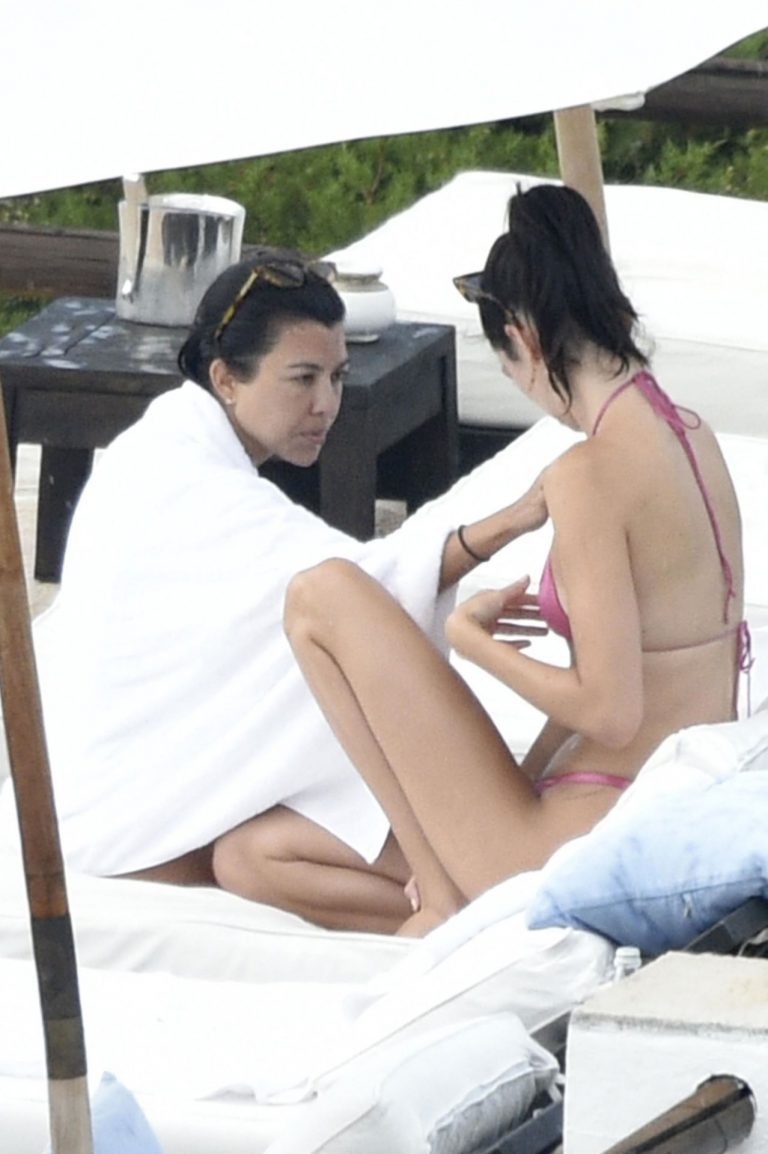Kendall Jenner with Kourtney Kardashian sexy asses in thong bikinis seen by paparazzi.

