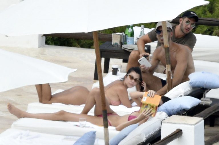 Kendall Jenner Bikini Pictures Kendall Jenner with Kourtney Kardashian sexy asses in thong bikinis seen by paparazzi.