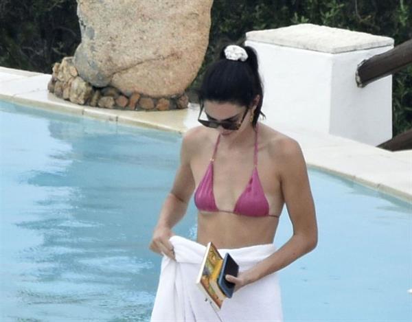 Kendall Jenner with Kourtney Kardashian sexy asses in thong bikinis seen by paparazzi.

