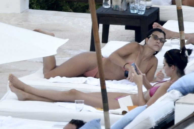 Kendall Jenner with Kourtney Kardashian sexy asses in thong bikinis seen by paparazzi.

