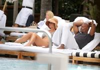 Brittany Daniel in a bikini