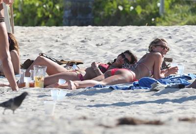 Nina Dobrev in a bikini