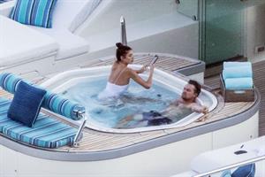 Camila Morrone in a sexy swimsuit in a hot tub on a yacht with Leonardo DiCaprio seen by paparazzi.










