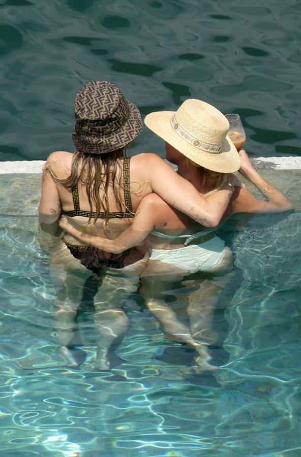 Miley Cyrus and Kaitlynn Carter making out kissing by the pool seen by paparazzi showing her lesbian side after leaving Liam Hemsworth.




