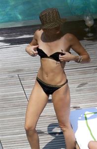 Miley Cyrus and Kaitlynn Carter making out kissing by the pool seen by paparazzi showing her lesbian side after leaving Liam Hemsworth.




