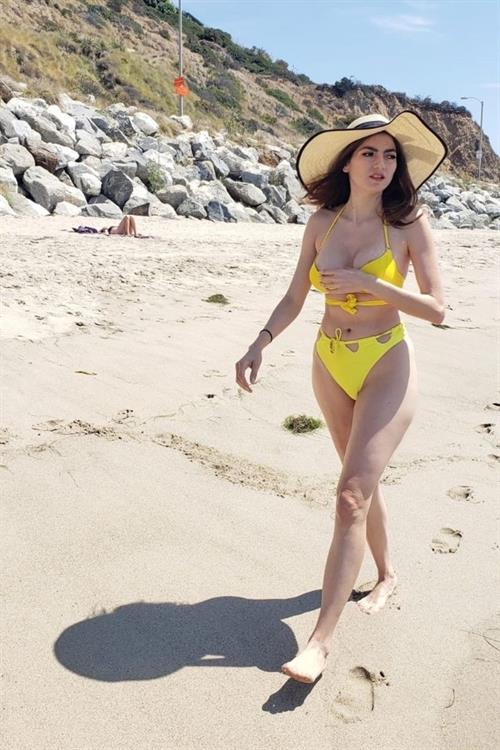 Blanca Blanco Bikini Pictures Blanca Blanco nip slip wardrobe malfunction and sexy ass in yellow thong bikini at the beach.