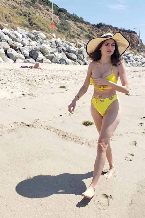 Blanca Blanco nip slip wardrobe malfunction and sexy ass in yellow thong bikini at the beach.
