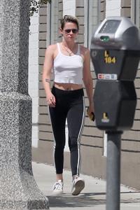 Kristen Stewart braless tits pokies seen by paparazzi in a white top showing off her boobs.










