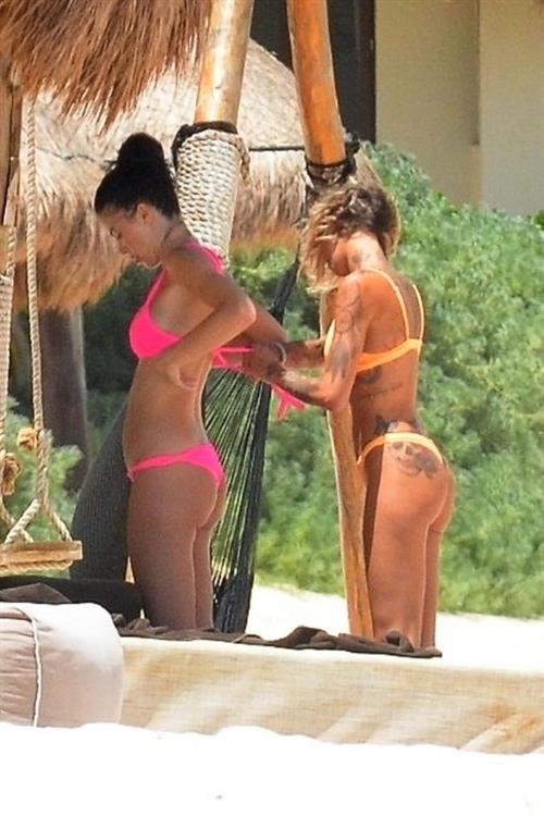 Jayde Nicole Bikini Pictures Jayde Nicole Sexy and Tina Louise caught nude by paparazzi showing their topless boobs at the beach.