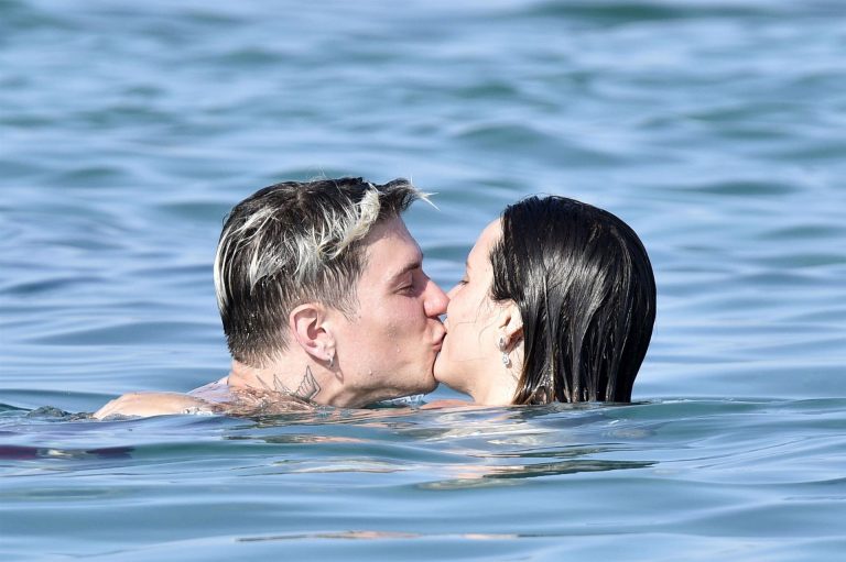 Bella Thorne Bikini Pictures Bella Thorne sexy in a thong bikini drinking and smoking weed out on the water showing off her ass seen by paparazzi.