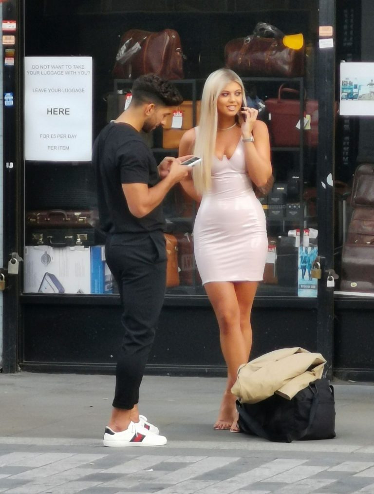 Belle Hassan Pictures Belle Hassan wardrobe malfunction as the ass of her dress rips she had to call someone to sew it seen by paparazzi.