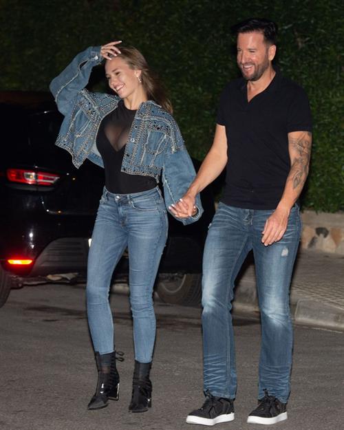Laura Müller Pictures Laura Müller braless boobs in a see through top showing nice cleavage seen by paparazzi.