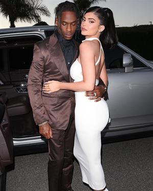 Kylie Jenner sexy ass in a tight white dress with Travis Scott at the premiere of  Look Mom I Can Fly .





































