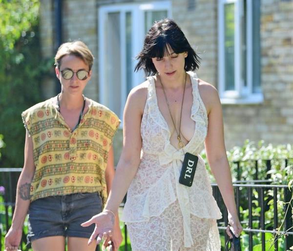Daisy Lowe braless boobs in a see through dress showing off her tits and cleavage seen by paparazzi.













































