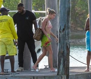Hailey Bieber, Kendall Jenner and Justine Skye sexy bikini and swimsuit photos seen on a boat drinking for Hailey Bieber's bachelorette party.
