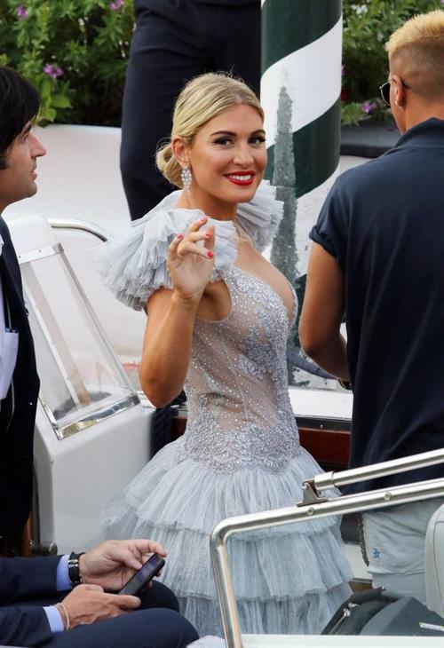 Hofit Golan braless boobs and a see through dress seen by paparazzi.

















