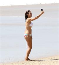 Bethenny Frankel Bikini Pictures Bethenny Frankel sexy ass in a bikini at the beach showing nice cleavage seen by paparazzi.