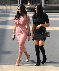 Nikki Bella braless boobs pokies in a black top showing off her tits seen by paparazzi with Brie Bella showing nice cleavage.










