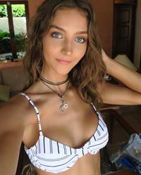 Rachel Cook in a bikini taking a selfie