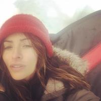 Sarah Shahi taking a selfie