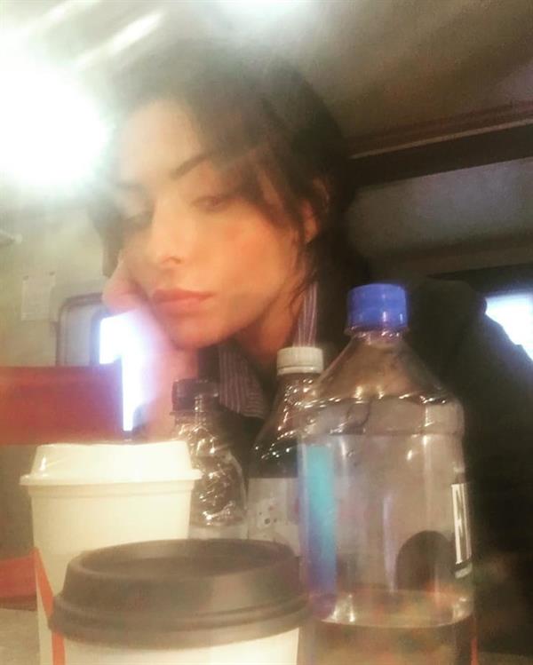 Sarah Shahi taking a selfie