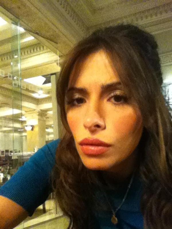 Sarah Shahi taking a selfie