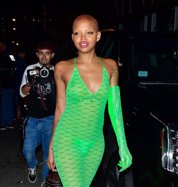 Slick Woods braless boobs in a see through dress showing off her tits and thong panties seen by paparazzi.




































