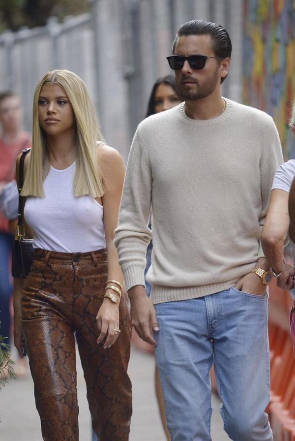 Sofia Richie braless boobs in a white tank top showing off her tits seen by paparazzi.















































