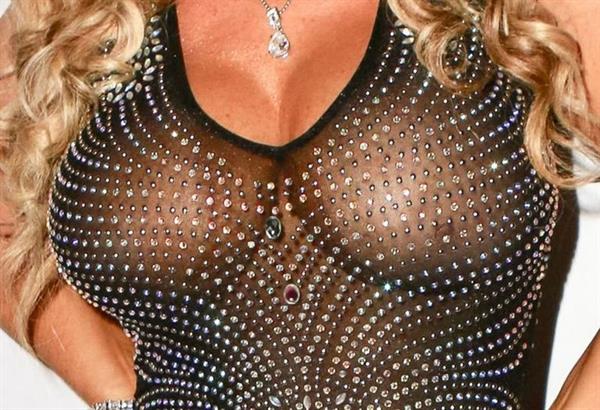 Coco Austin braless boobs in a see through dress showing off her tits seen by paparazzi.
















































