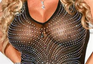 Nicole Coco Austin Nude Pictures Coco Austin braless boobs in a see through dress showing off her tits seen by paparazzi.