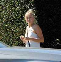 Malin Akerman braless tits showing off her boobs in a blouse top seen by paparazzi.












