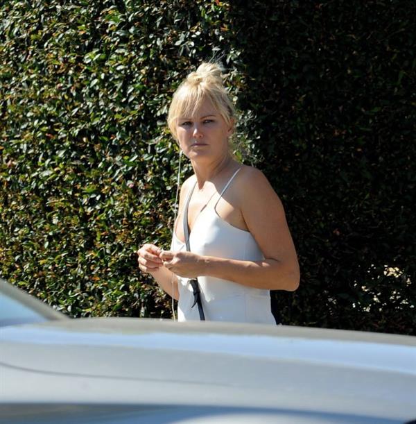 Malin Akerman braless tits showing off her boobs in a blouse top seen by paparazzi.












