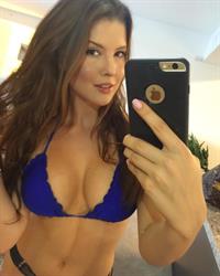 Amanda Cerny in a bikini taking a selfie