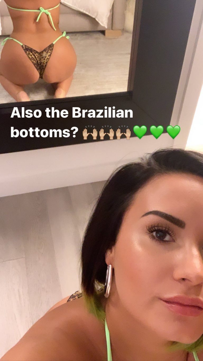 Demi Lovato Bikini Selfie Pictures Demi Lovato sexy ass booty and boobs in a thong bikini showing nice cleavage.
