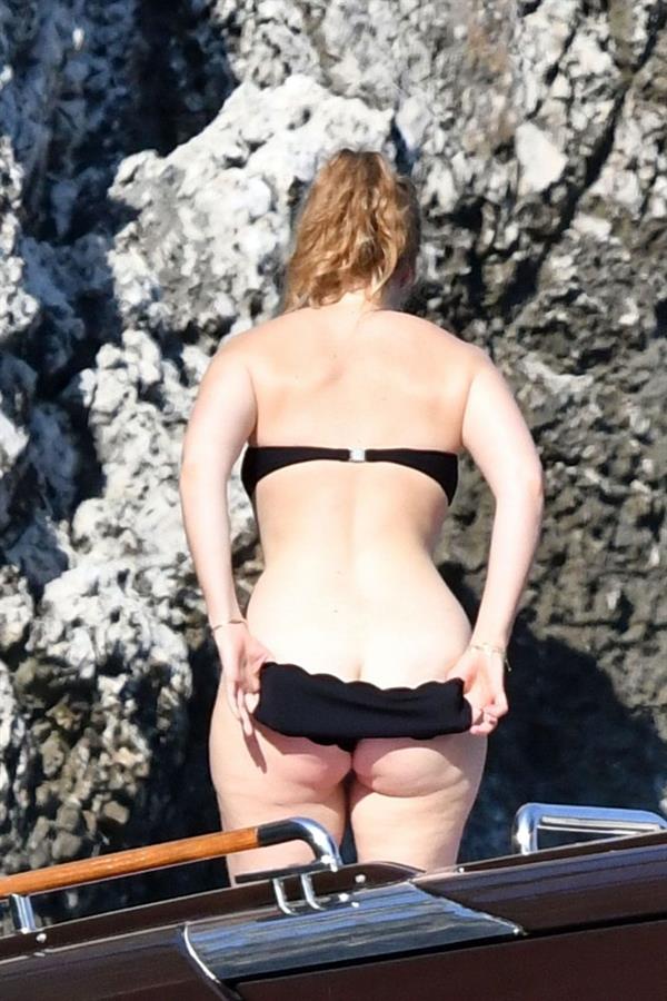 Princess Beatrice nude and sexy ass in a bikini caught by paparazzi showing some nice cleavage.
























