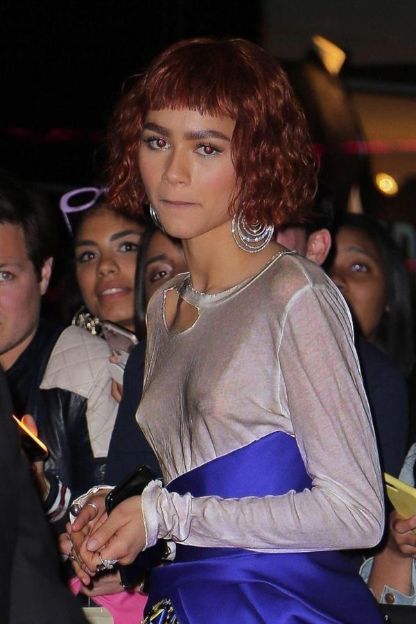 Zendaya braless boobs in a see through top edited to make it more visible showing her tits.

























