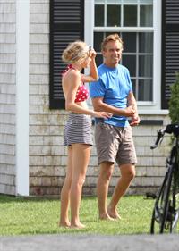 Taylor Swift wearing a bikini top and swimsuit in Hyannis on April 12, 2013