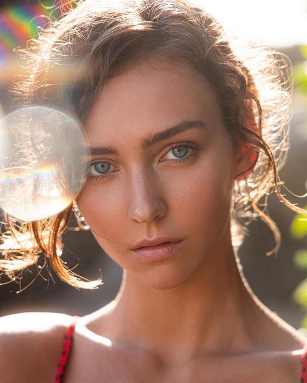 Rachel Cook on the Beach in a Red Print Bikini