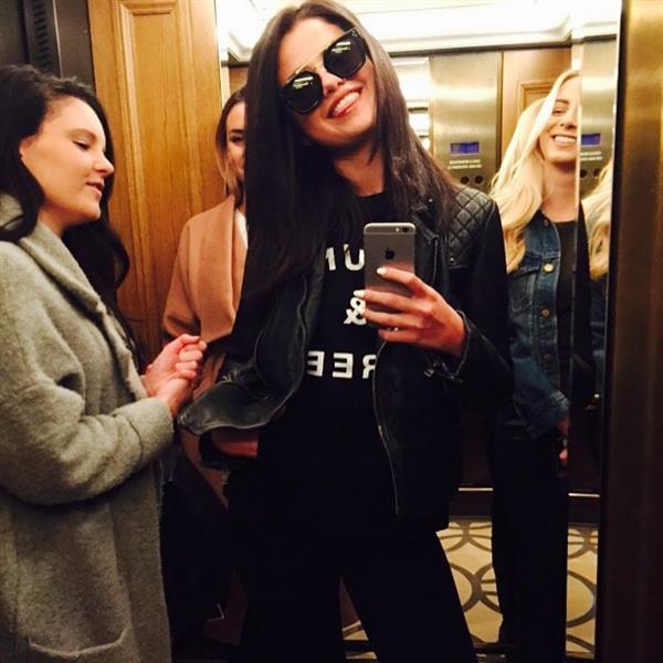 Selena Gomez taking a selfie