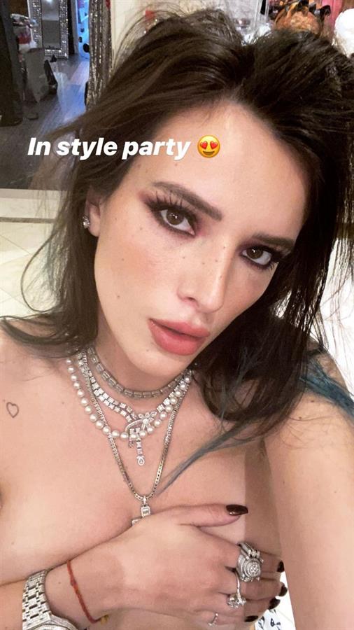 Bella Thorne topless new photo holding her nude boobs.