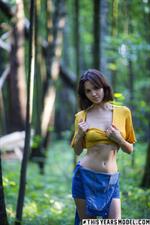 Lara is bare in the Russian woods