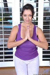 Milf with big natural boobs stretches her body while doing yoga