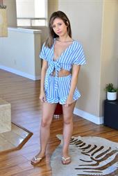 Daphne Dare is an angelic looking cutie whose sweet smiles hide a lust that's second to none. She'll whip out her small tits with their luscious tan lines, then keep on stripping until she's nude. Don't you dare forget about her tender nipples as you're enjoying the slippery delight of her meaty bare twat. 