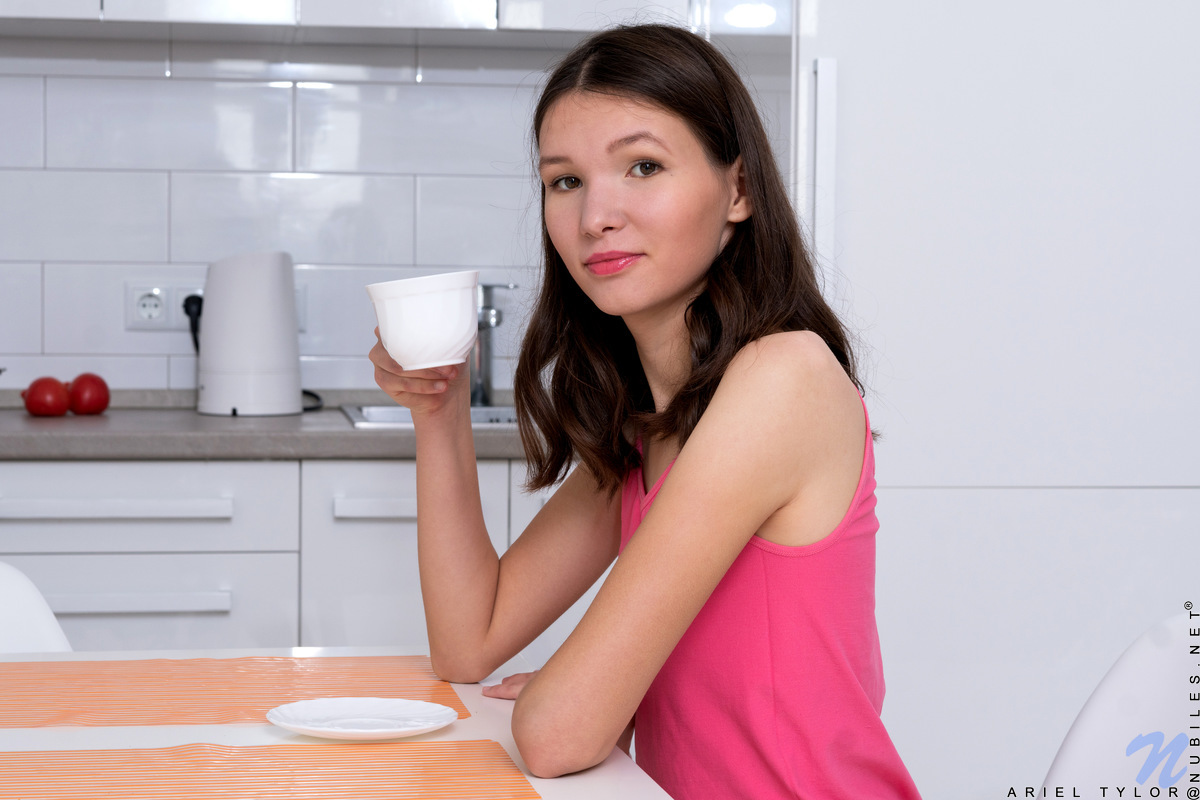 There's nothing hotter than a willowy cutie like Ariel Tylor as she just chills in the morning. As she enjoys her quiet morning, she starts slipping out of her clothes and letting her hands explore her slender curves. When she reaches her bare pussy, she can't help but start masturbating!