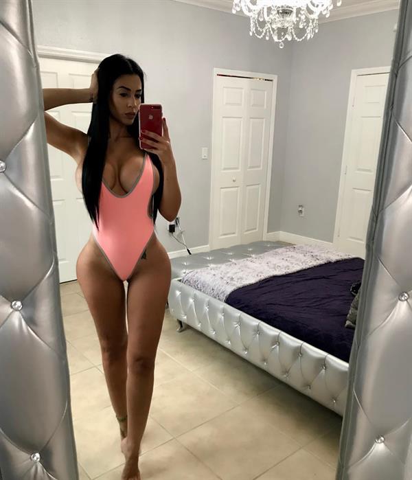 Maybel Sanchez in a bikini taking a selfie