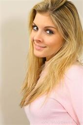  The beautiful Naomi takes a shower after getting home from a day at the office. 