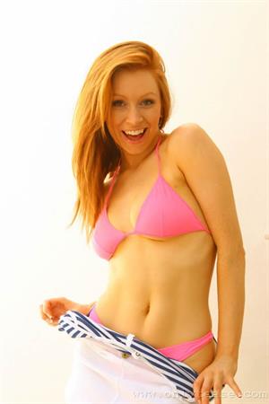 Alexandra Nude Pictures Nautical redhead Alexandra looking stunning