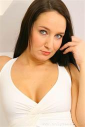  The lovely Sammie will take your breath away in this beautiful beige outfit. 